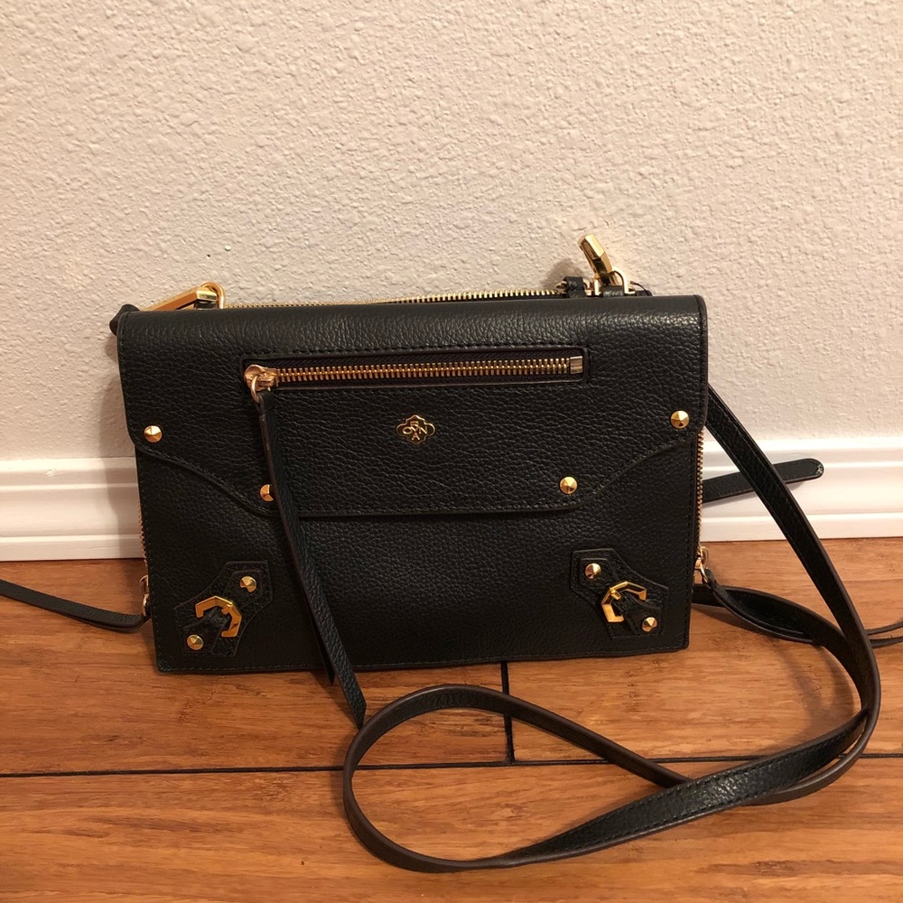 orYany pebble leather crossbody bag in black
